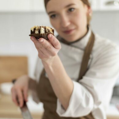 medium-shot-cook-holding-cookie